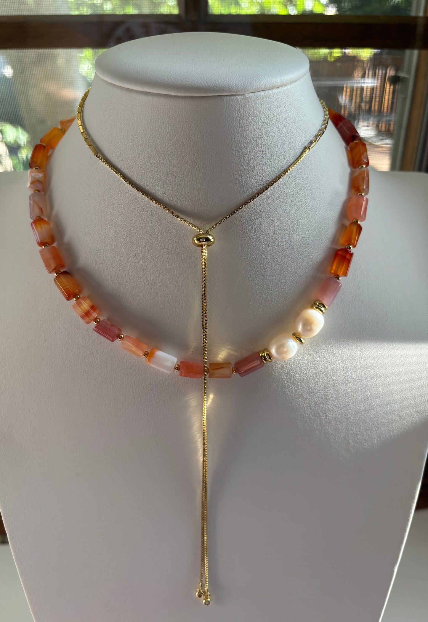 Orange Beaded necklace with pearl