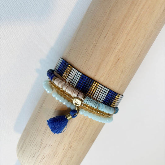 Bracelet stack in blue and gold