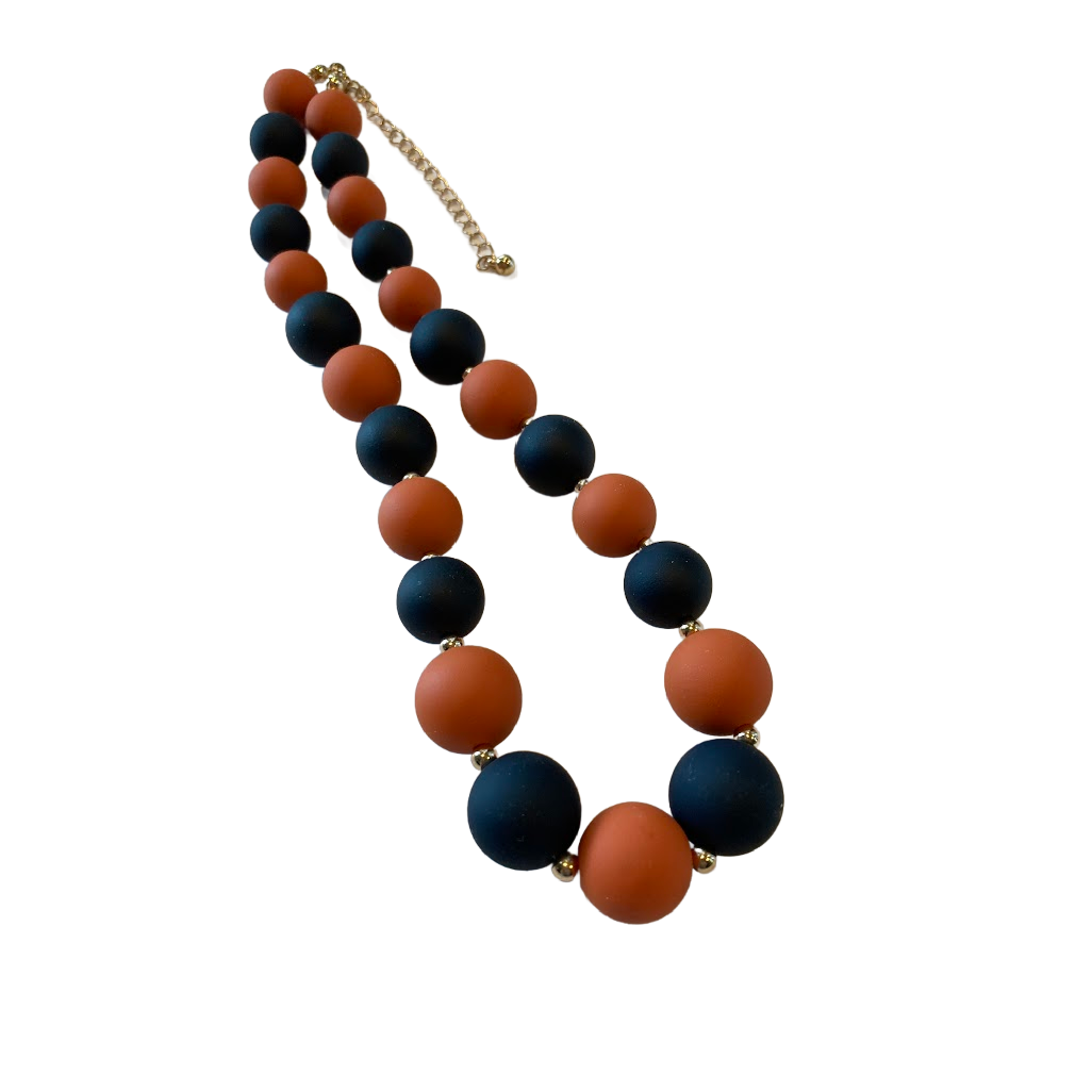 orange and blue circle of beads