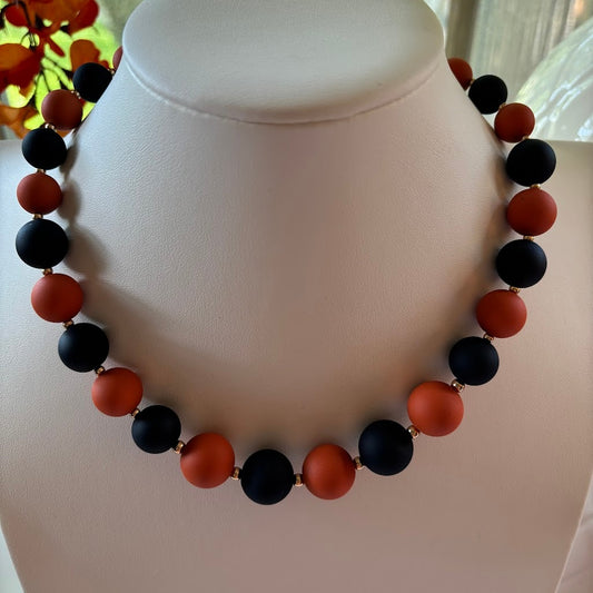 orange and blue circle of beads