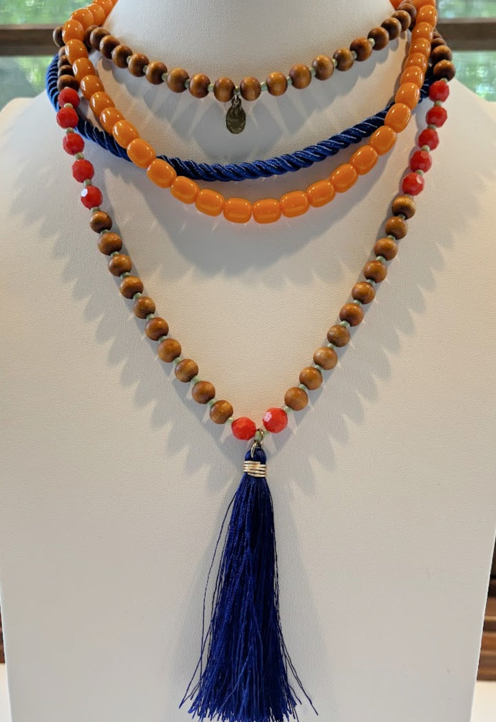 Wooden necklace with orange and blue