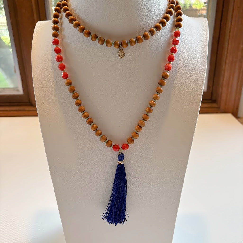 Wooden necklace with orange and blue